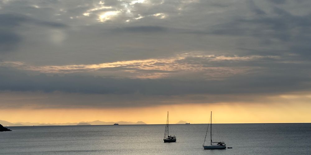 Start the day with a sunrise over Agia Marina Bay